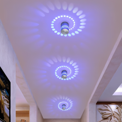 LuminBlast LED Spiral Væglampe med Farverigt Lys til Moderne Indendørs Belysning