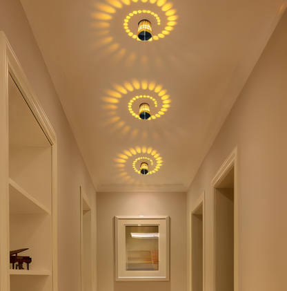 LuminBlast LED Spiral Væglampe med Farverigt Lys til Moderne Indendørs Belysning