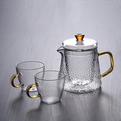 Pindefang Glastekande med Teinfuser og Gyldent Håndtag Varmebestandig
