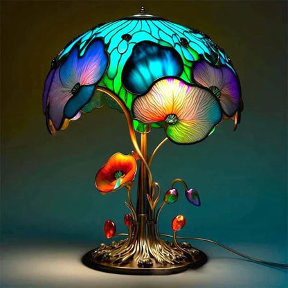 Bordlampe i farvet glas med dekorativ LED-belysning