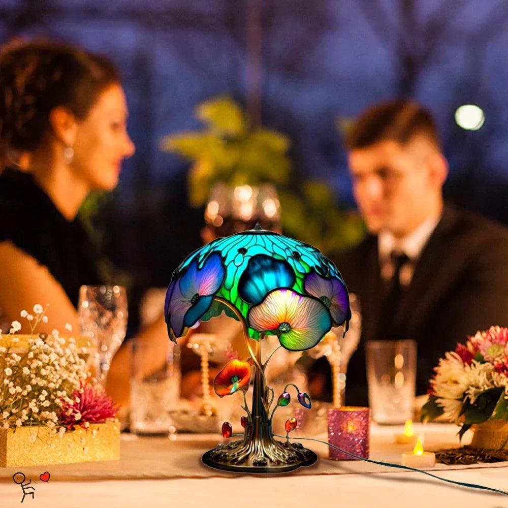 Bordlampe i farvet glas med dekorativ LED-belysning
