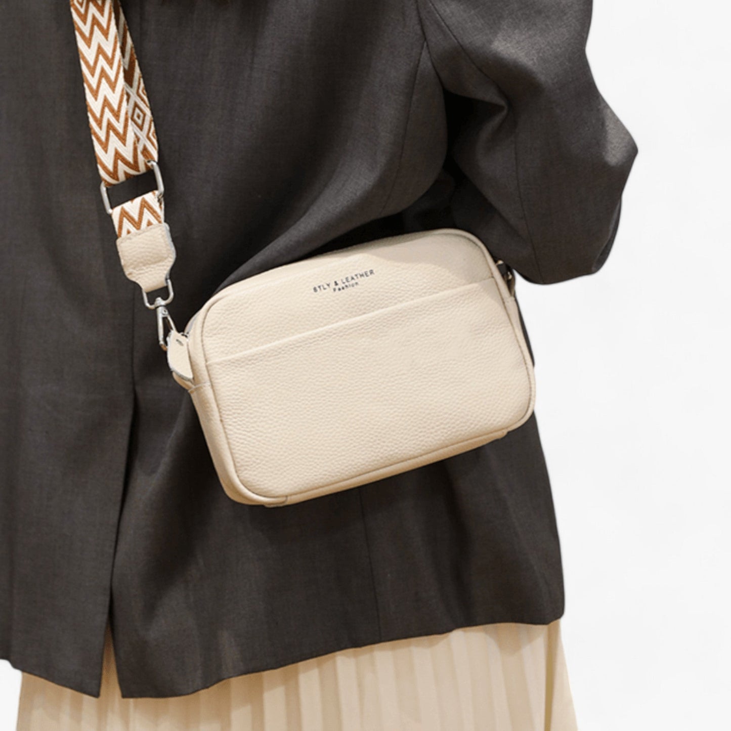 Elegant crossbody taske i læder til kvinder med kompakt design