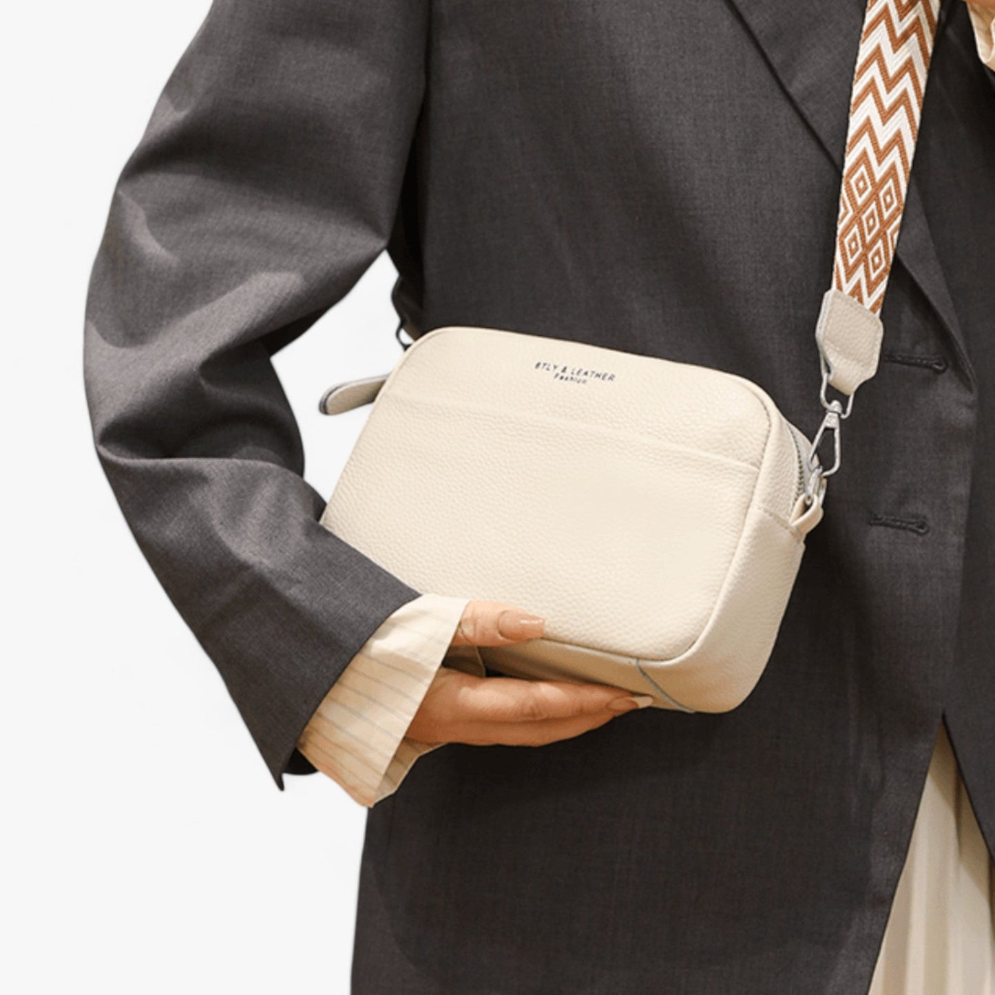 Elegant crossbody taske i læder til kvinder med kompakt design
